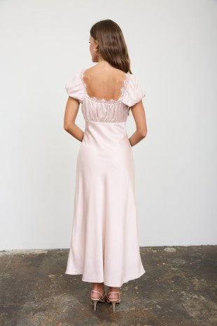Champagne satin midi dress featuring a sweetheart neckline, puff sleeves, gathered bust, contrast lace overlay, sheer lace waist detail, side zipper, lightweight lined fabric, feminine wedding guest and bridal shower dress.