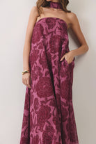 Flowy strapless floral maxi dress with oversized blooms, detachable scarf, hidden side pockets, relaxed A-line fit, and lined lightweight fabric