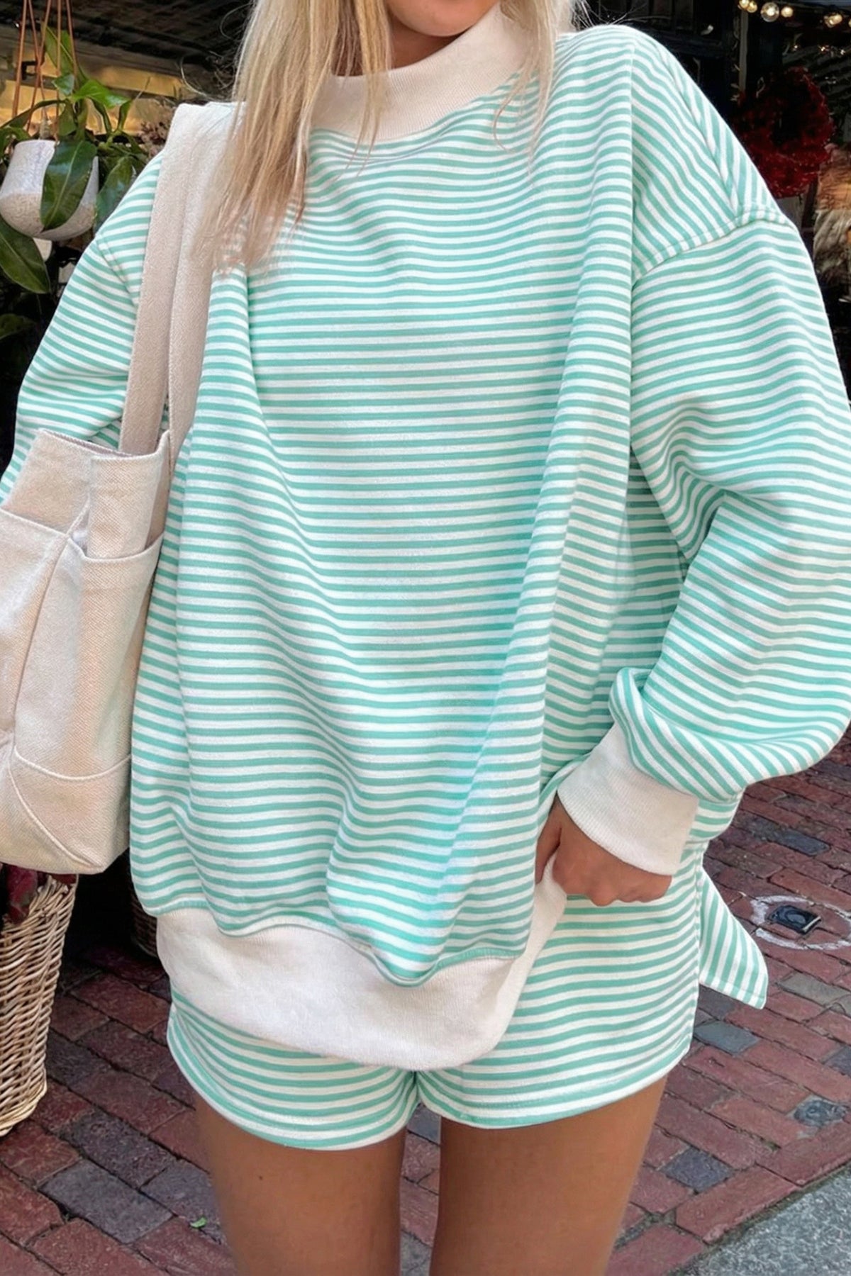 Green striped casual two-piece set with mock neck sweatshirt and pull-on shorts