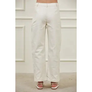 Structured high-rise barrel leg pants with full-length side panel seams, belt loops, button zipper closure, and front pockets