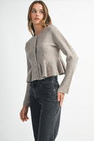 Soft taupe button-down knit peplum jacket with defined waist, cozy and elegant everyday layering piece.