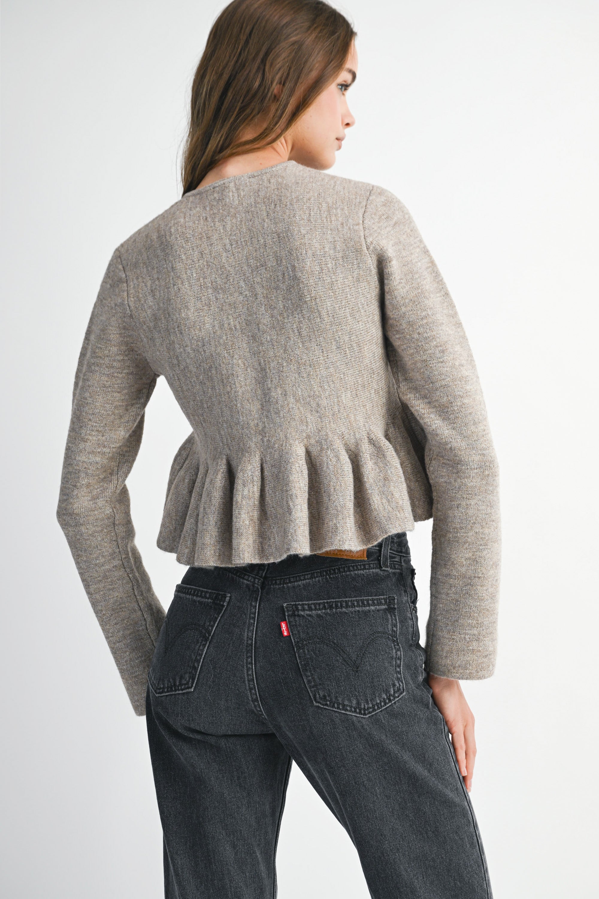 Soft taupe button-down knit peplum jacket with defined waist, cozy and elegant everyday layering piece.