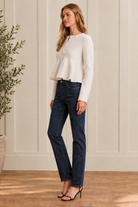 Thread Bar Boutique feminine peplum cardigan in a wool blend with fitted bodice, flared hem, covered buttons, round neckline, and cropped length, ideal for styling with denim, skirts, and tailored pants.