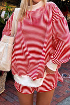 Red stripe two-piece lounge set with oversized mock neck sweatshirt and shorts