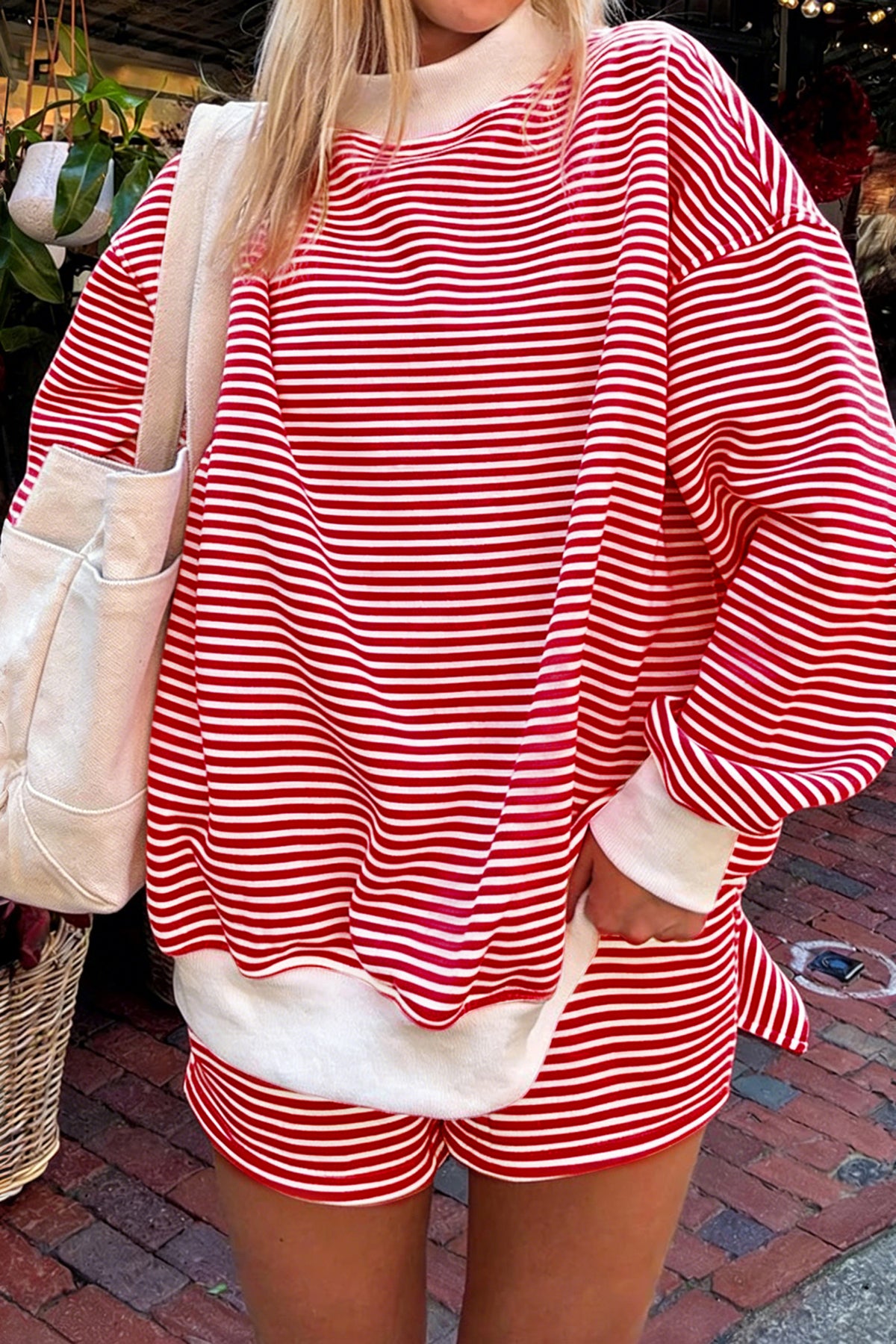 Red stripe two-piece lounge set with oversized mock neck sweatshirt and shorts