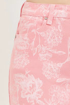 Risen floral pattern high rise pink shorts close up fabric