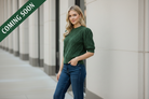 Women's short sleeve cable knit sweater in pine green with voluminous puff sleeves and a relaxed silhouette from Thread Bar Boutique