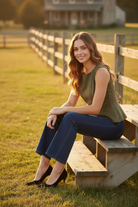 Close-up of women's soft suede-feel peplum top featuring detailed seam stitching and structured polyester-spandex fabric