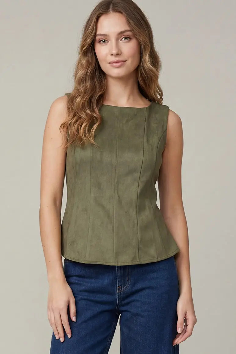 Women's olive suede-feel peplum top styled with jeans for an elevated casual outfit with a fitted waist and flared hem
