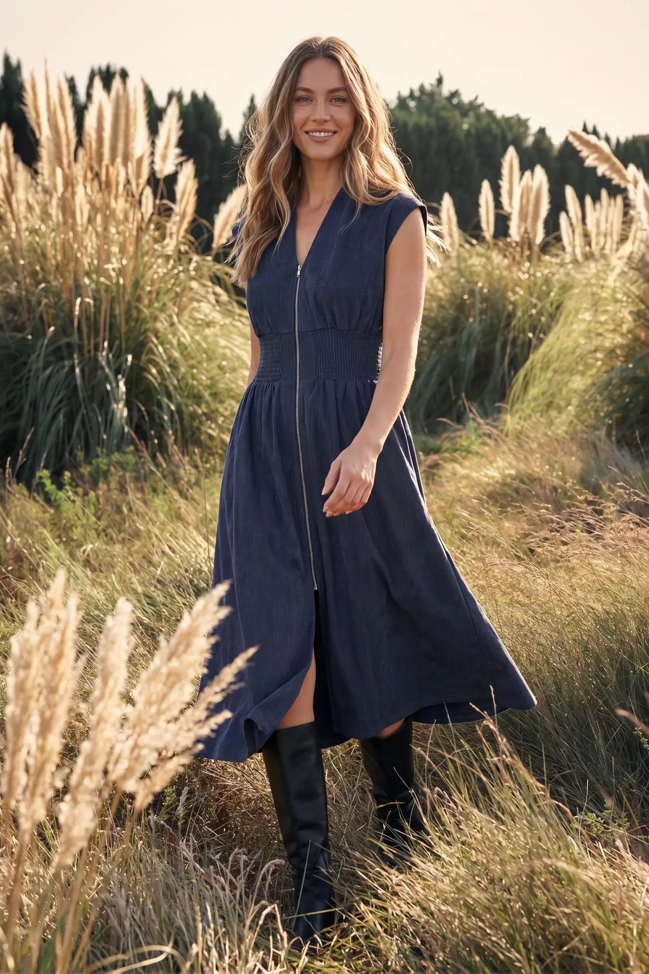 Women's suede zip front midi dress with smocked waist, drop shoulders, V-neckline, side pockets, and cap sleeves, featuring a flattering fall transition silhouette with elevated casual style.