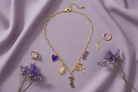 TCU charm necklace flat lay for game day