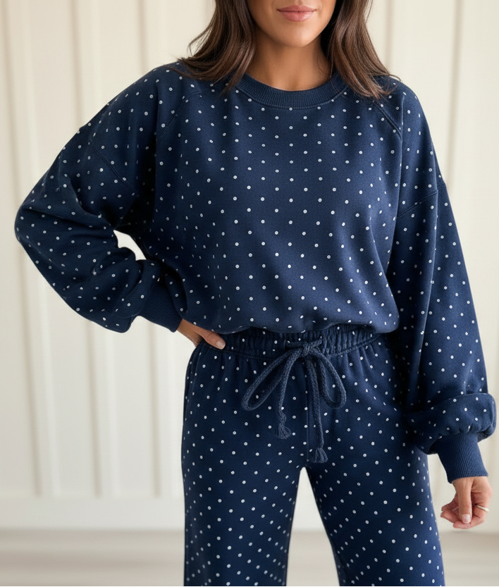 Casual polka dot matching set featuring a round-neck long-sleeve top with ribbed cuffs and coordinating drawstring waist pants