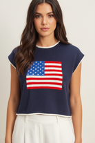 Cropped knit tank with bold American flag graphic, rolled edge neckline, and cap sleeves