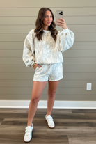 Women’s khaki camouflage shorts set with long sleeve balloon top, ribbed cuffs, and adjustable drawstring waist