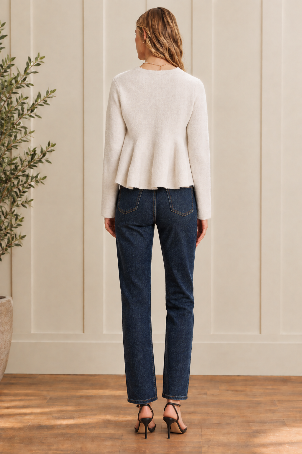  Wool-blend peplum cardigan from Thread Bar Boutique featuring a fitted silhouette, softly flared hem, covered button front, round neckline, and cropped length, perfect with jeans, skirts, or trousers.