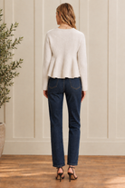  Wool-blend peplum cardigan from Thread Bar Boutique featuring a fitted silhouette, softly flared hem, covered button front, round neckline, and cropped length, perfect with jeans, skirts, or trousers.