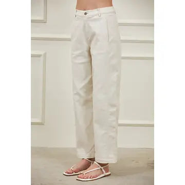 Modern women’s woven barrel pants featuring a high waist, relaxed hip and thigh, tapered hem, and sculptural side panel seams