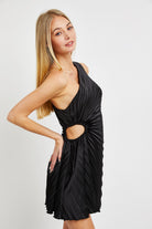 Modest black pleated dress without cutout detail 
