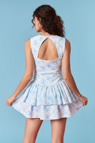 Women’s floral athletic dress romper with open back cutout at Thread Bar Boutique