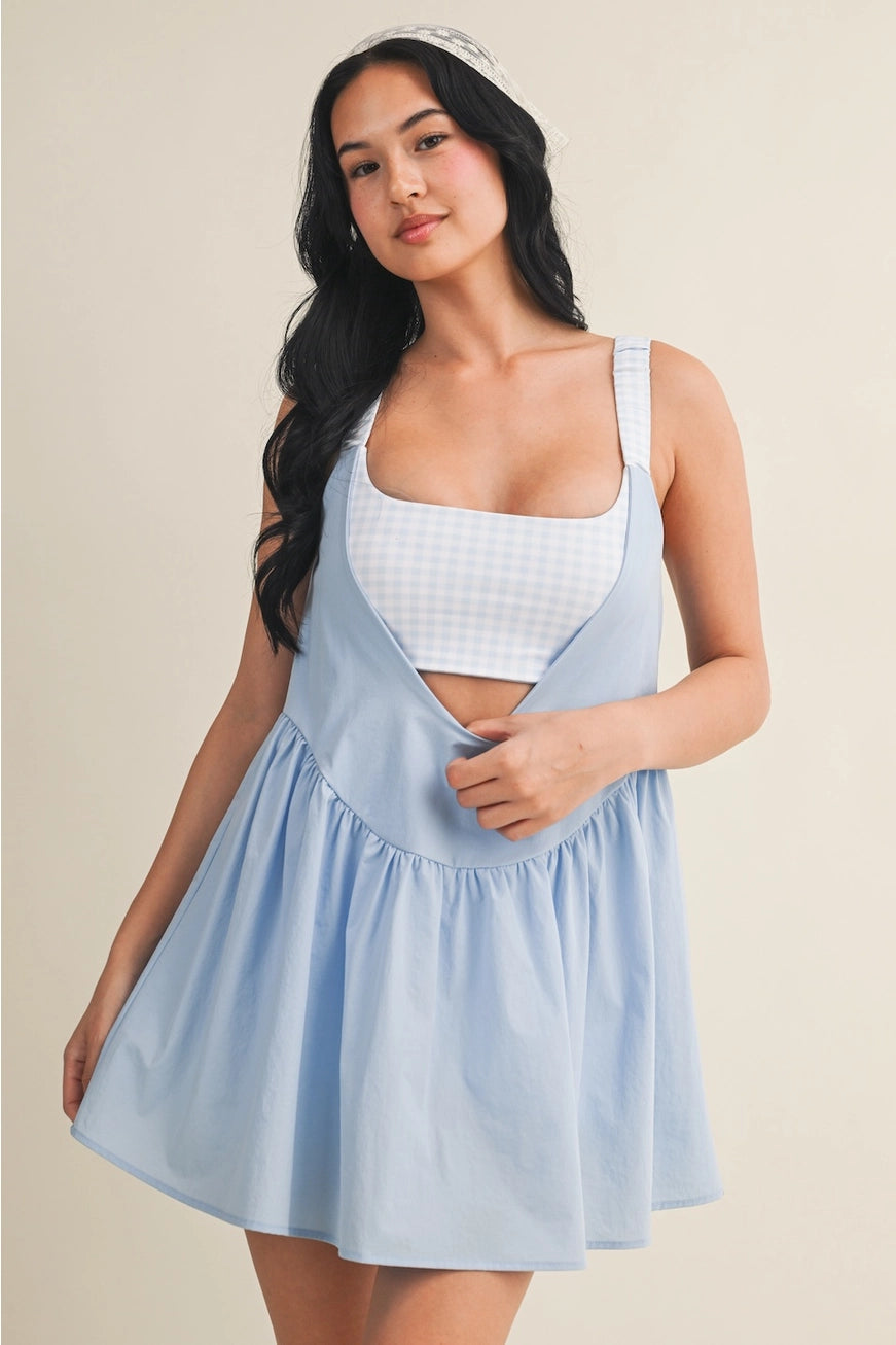 Stylish gingham tennis style dress with built-in shorts from Thread Bar Boutique perfect for active lifestyle