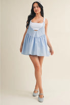 Casual layered gingham active dress with layered skirt and built-in shorts from Thread Bar Boutique sporty feminine style