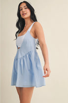 Stylish gingham layered play dress with built-in shorts from Thread Bar Boutique perfect for active lifestyle