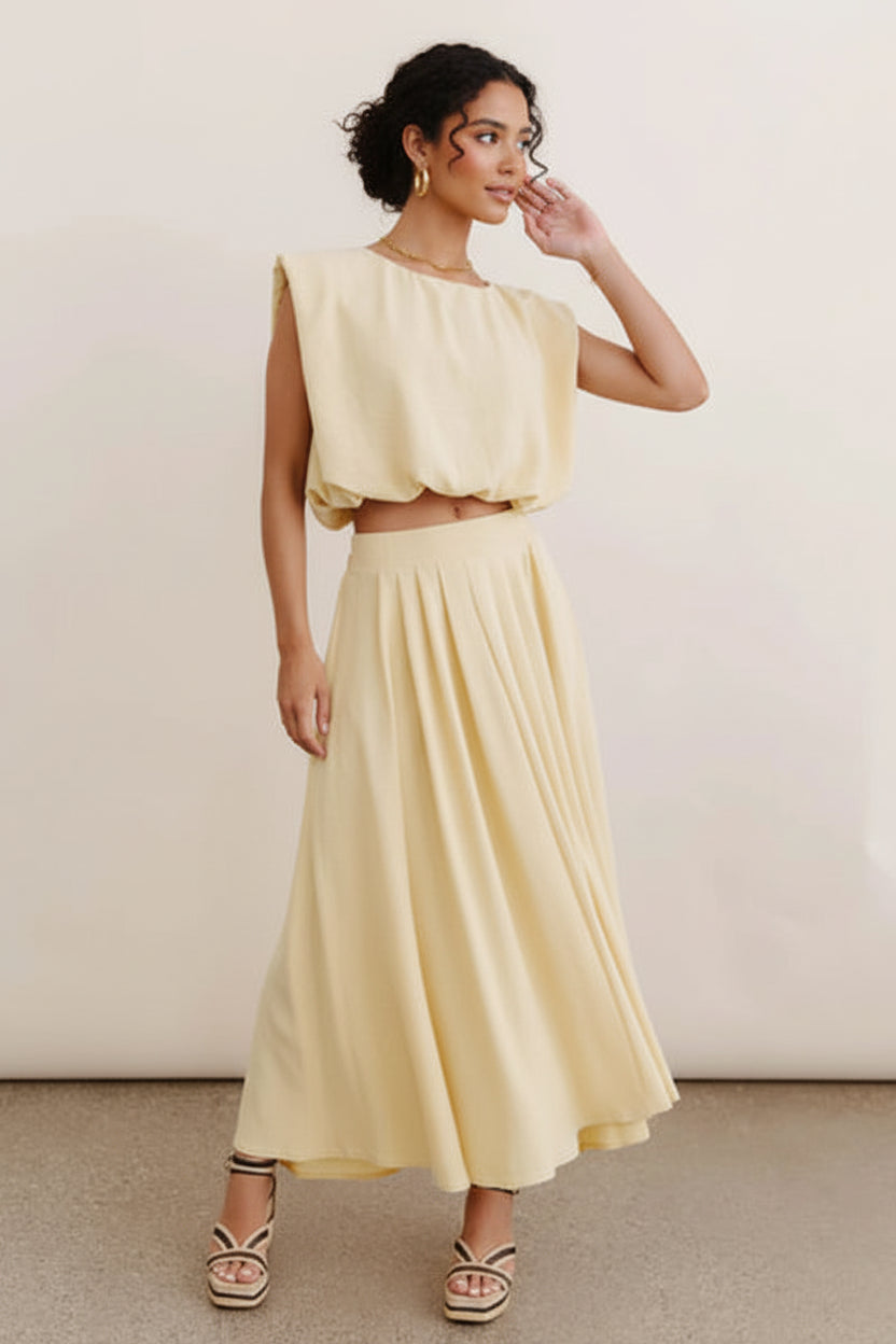 Chloe softly structured sleeveless cropped blouse in a lightweight draped fabric.
