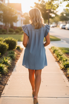 Women’s chambray denim mini dress with frill trim and relaxed shift fit