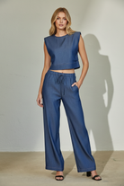 Indigo wide-leg denim pants with adjustable drawstring waist in soft Tencel blend fabric, relaxed fit women’s bottoms
