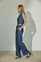 Flowy wide-leg denim pants in indigo with drawstring waist, soft structured Tencel blend, and relaxed modern fit