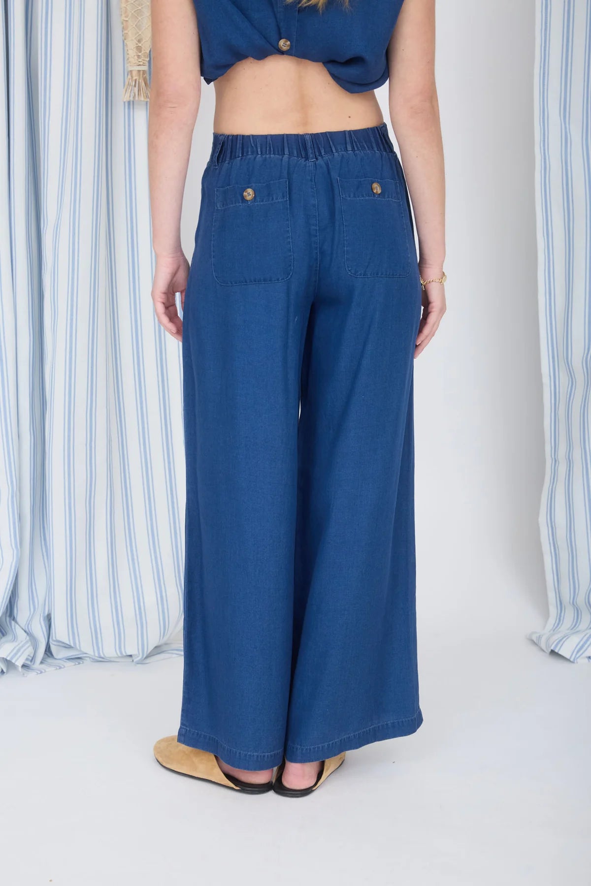 wide leg pintuck chambray pants part of a matching set rear view