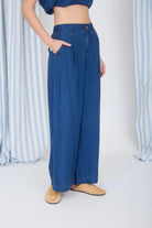wide leg pintuck chambray pants part of a matching set side view