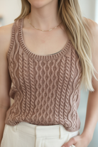 Casual chic cable knit tank top with relaxed fit and soft cotton feel