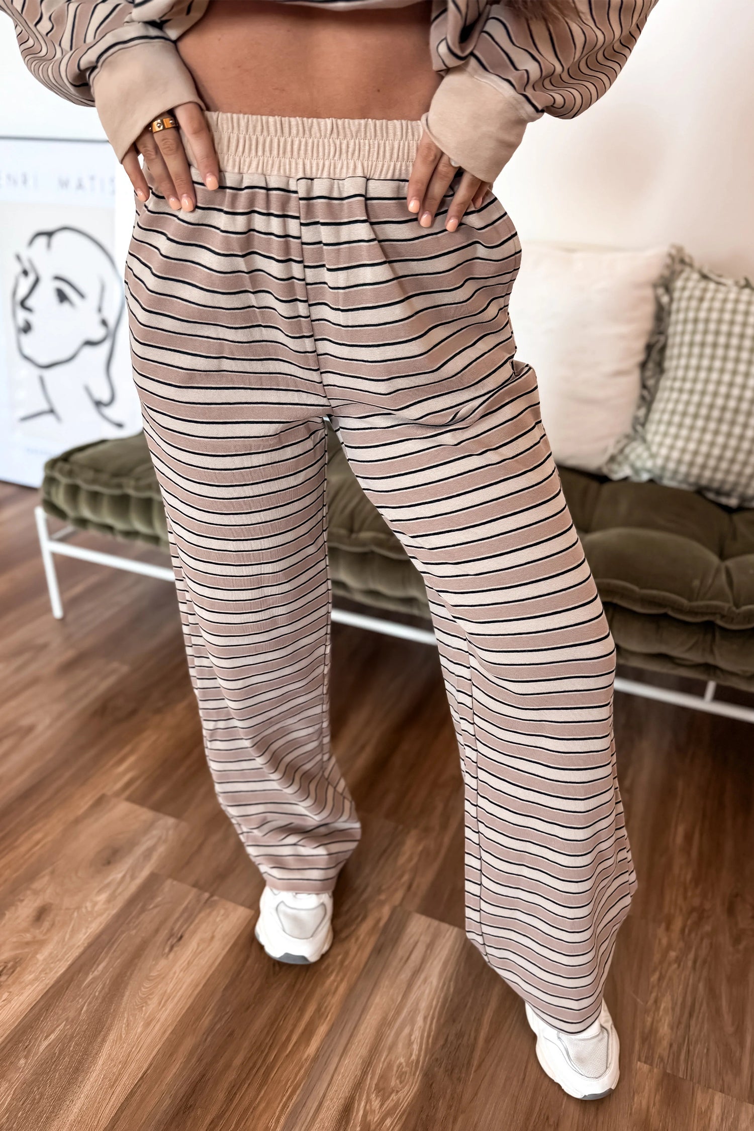 Casual khaki striped two-piece outfit with relaxed-fit long-sleeve top, round neckline, and matching wide-leg pants with elastic waistband