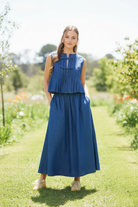 Thread Bar Boutique denim maxi skirt with elastic high waist, flowing silhouette, and matching set design in breathable cotton