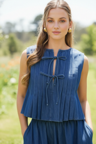 Thread Bar Boutique sleeveless pintuck denim top with front tie closure and relaxed, breezy silhouette for warm-weather styling part of a coordinated set