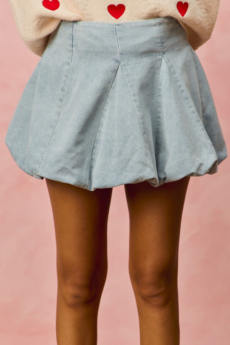 Casual and chic bubble mini skirt in light denim from Thread Bar Boutique, mini length with structured fit for effortless style