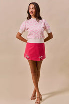 Thread Bar Boutique rhinestone embellished velvet skirt with structured fit and feminine bow slit detailing for cocktail events.