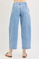 Rear view Risen medium wash slouchy crop barrel pleated jeans. Slight stretch, sizes 0–15, tailored pleated detail. Modern vintage denim at Thread Bar Boutique.