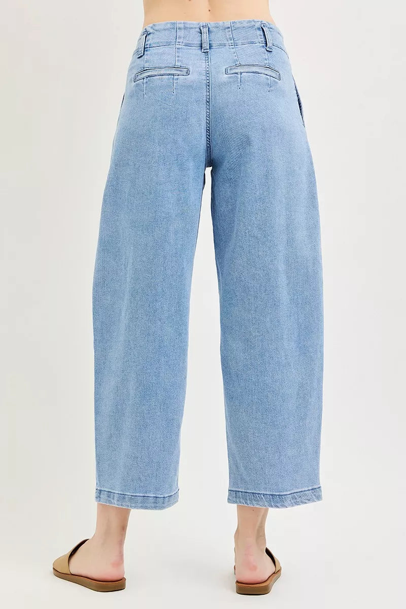 Rear view Risen medium wash slouchy crop barrel pleated jeans. Slight stretch, sizes 0–15, tailored pleated detail. Modern vintage denim at Thread Bar Boutique.