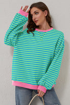 Women’s Casual Cool Stripe Oversized Sweatshirt with drop shoulder and contrast trim in relaxed fit, styled with denim