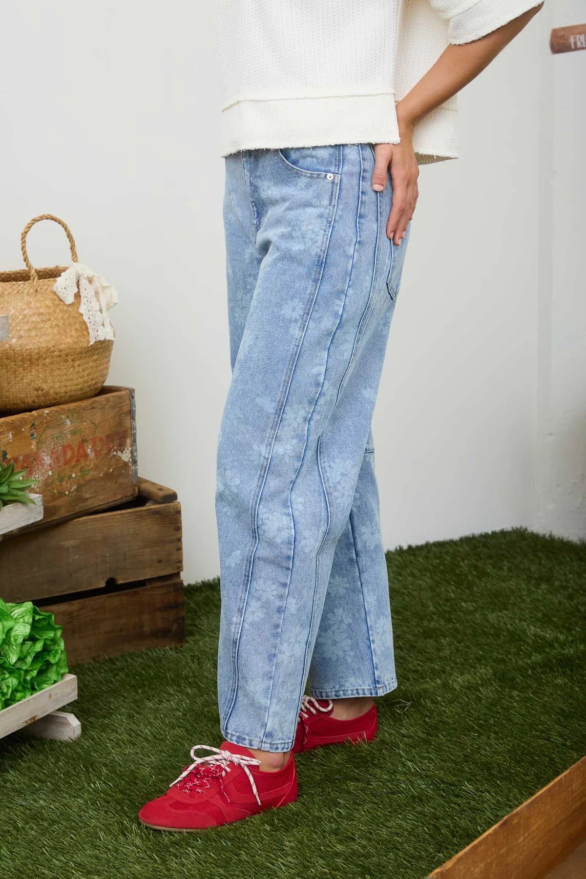 Washed floral barrel jeans styled for casual everyday wear