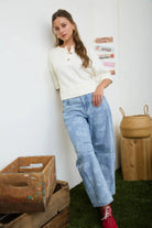 Trendy washed denim barrel jeans with allover floral pattern