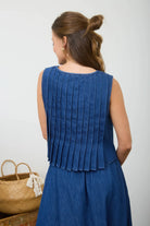 read view of pleated denim top and skirt set