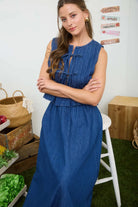 front view of denim peated top with ties and skirt set