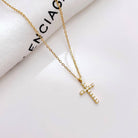 Dainty rhinestone cross necklace with adjustable chain, tarnish-free stainless steel and gold or silver finish for everyday wear