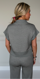 Dark gray half zip polo shirt and relaxed pants matching set