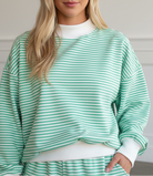 Green stripe two-piece lounge set with oversized mock neck sweatshirt and shorts