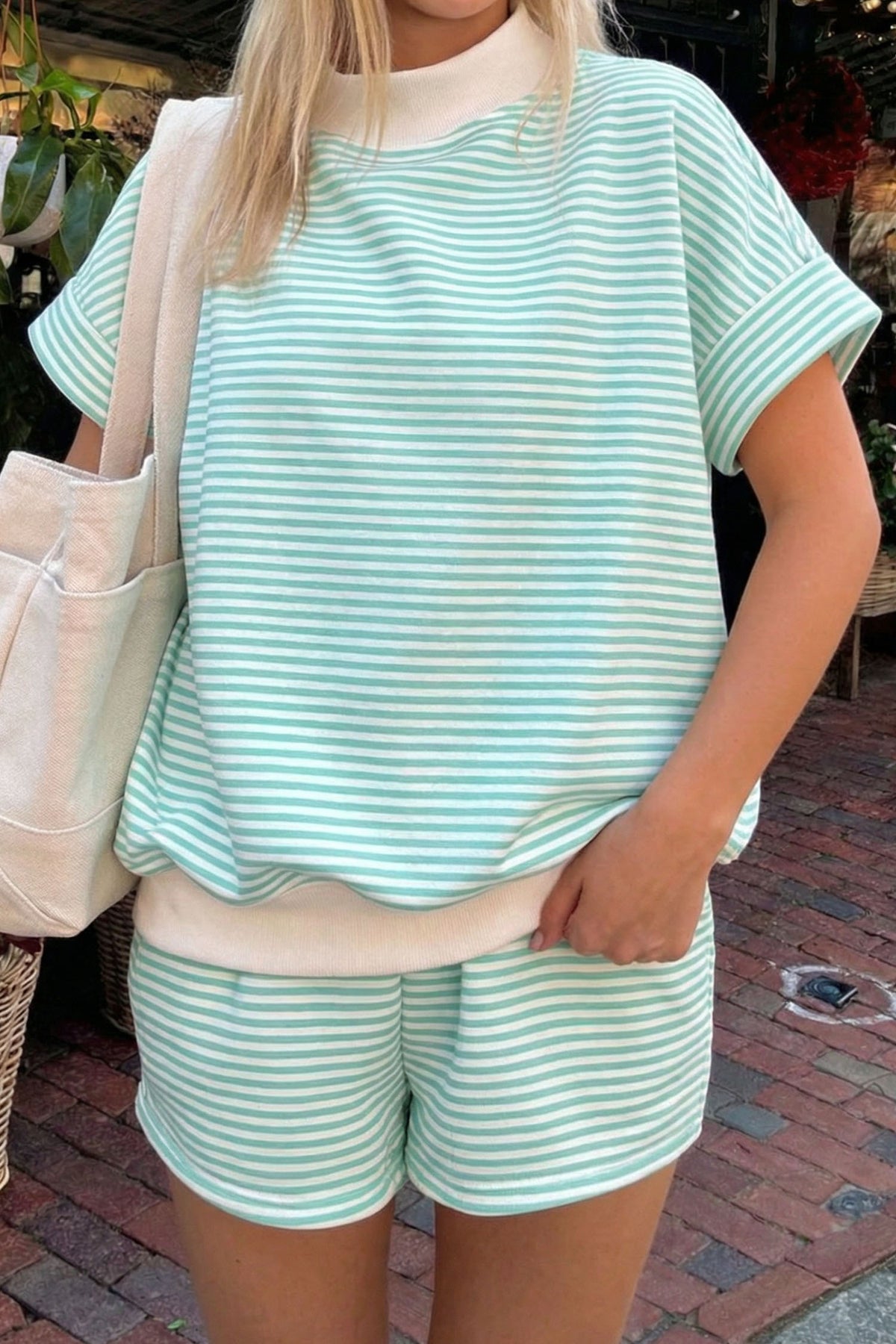 Green striped mock neck tee and shorts set for women from Thread Bar Boutique