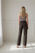 Hidden Jeans brown cheetah print straight leg jeans for women featuring a classic five-pocket design, 11-inch rise, 31-inch inseam, and comfortable stretch denim.
